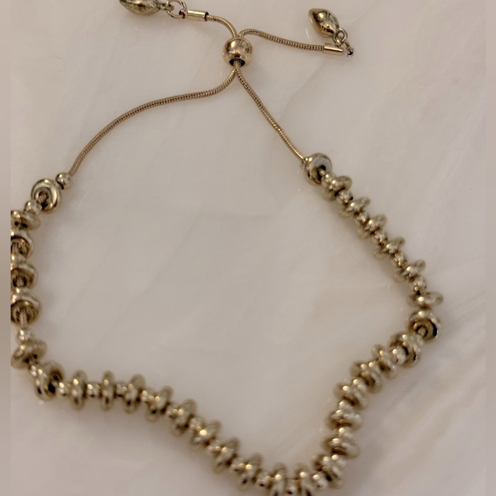 Gold pull string beaded bracelet!  Will fit any wrist size.